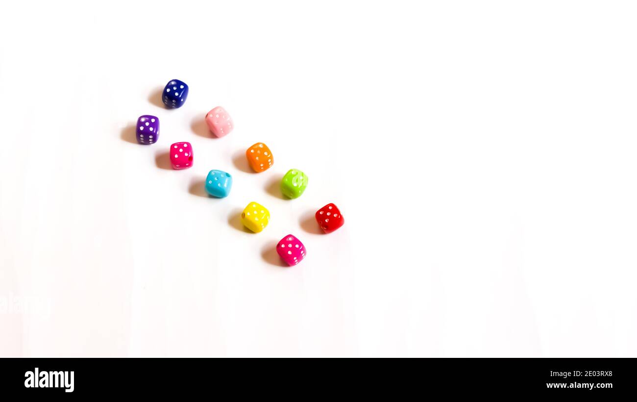 Colored dice on a white background. Stock Photo