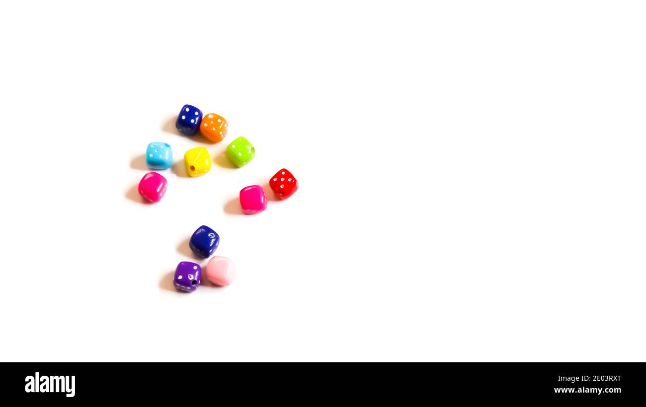 Colored dice on a white background. Stock Photo