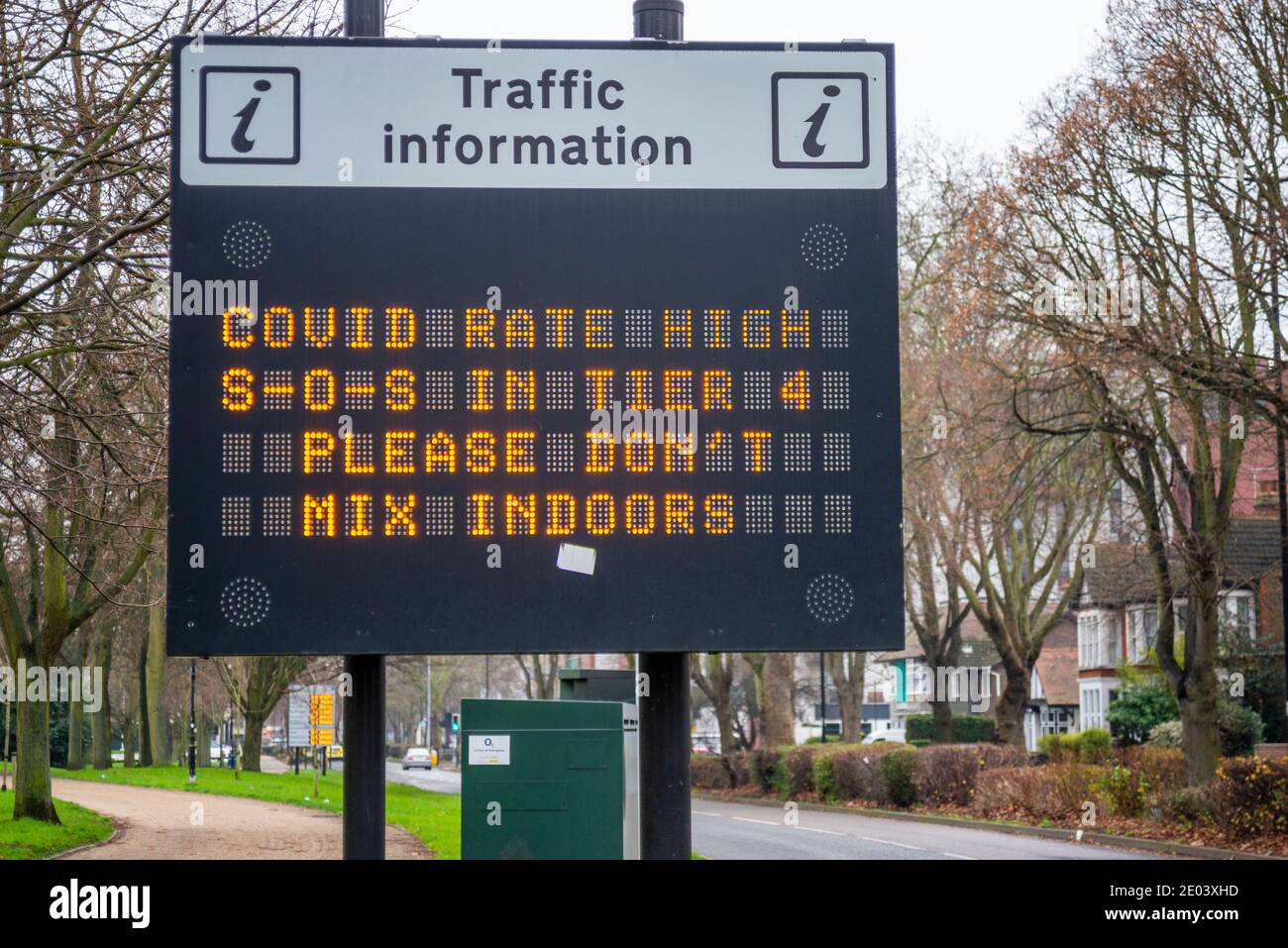 Electronic matrix sign with COVID 19 message in Southend on Sea, Essex, UK. COVID rate high, Tier 4, please don't mix indoors. Coronavirus warning Stock Photo