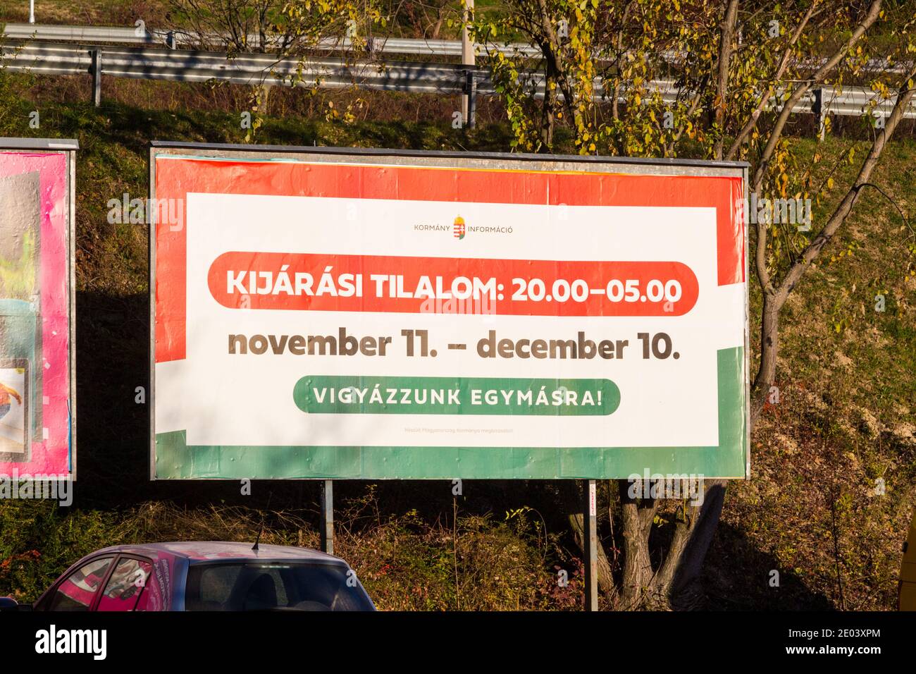 'Kijarasi tilalom' (night curfew) billboard sign, during covid-19 pandemic in winter 2020, Sopron, Hungary Stock Photo