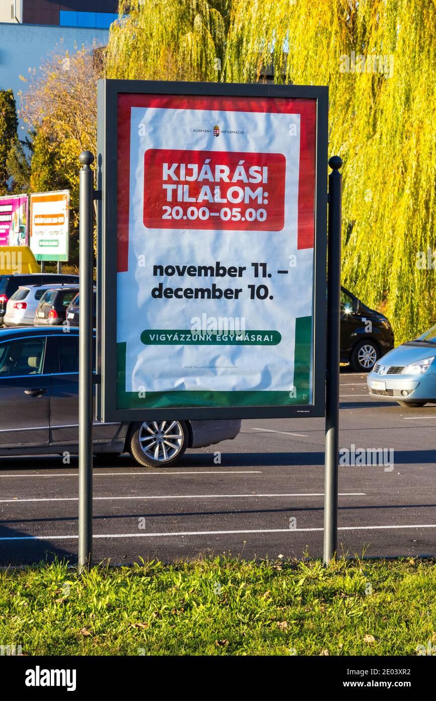 'Kijarasi tilalom' (night curfew) sign, during covid-19 pandemic in winter 2020, Sopron, Hungary Stock Photo