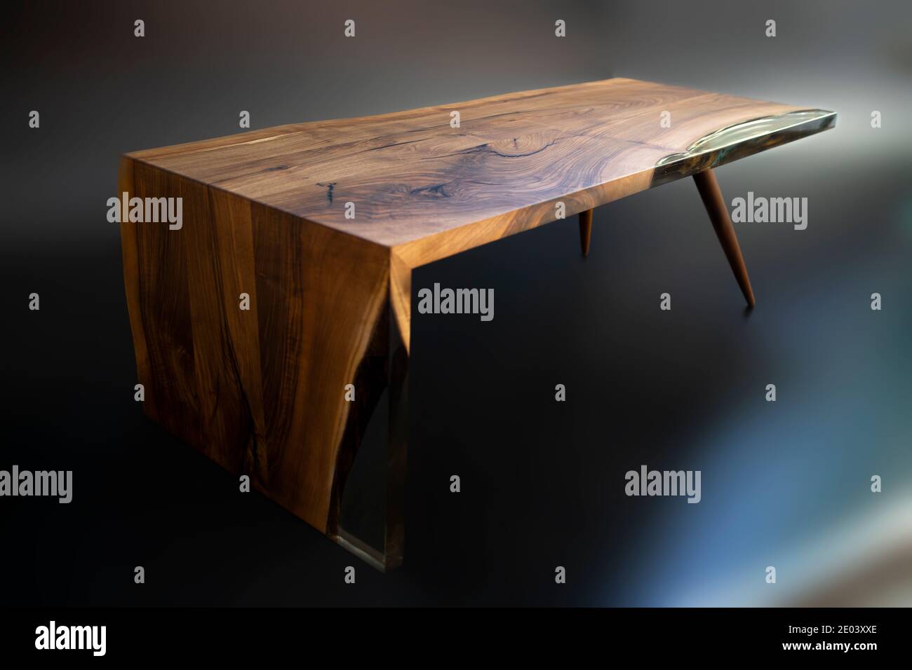 Modern handmade table made from walnut tree Stock Photo