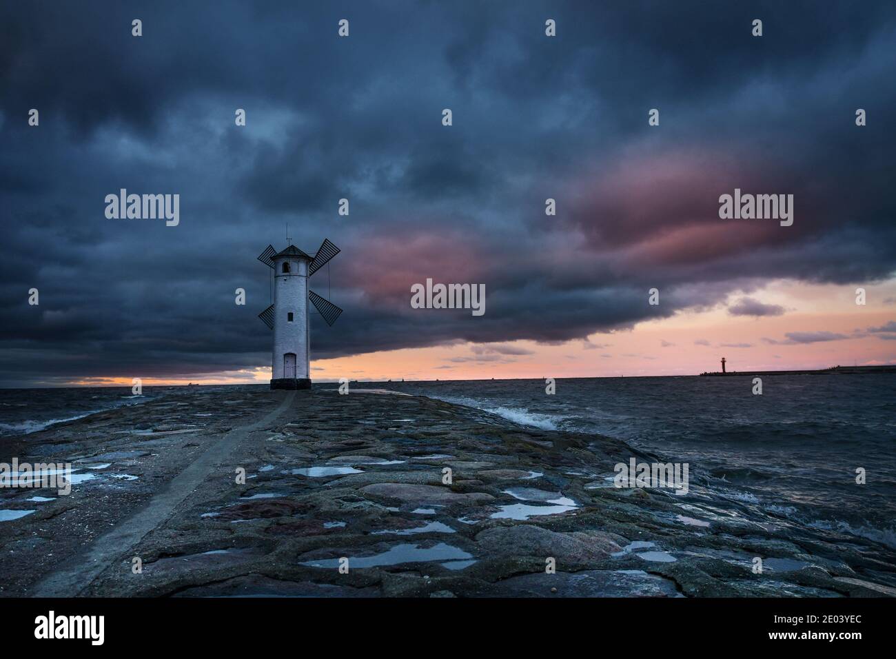 Windmill in dark sky Stock Photo