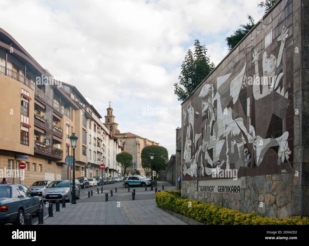 Mural based on the Picasso painting. Basque nationalists advocate that the painting be brought to the town, as can be seen in the slogan underneath. Stock Photo
