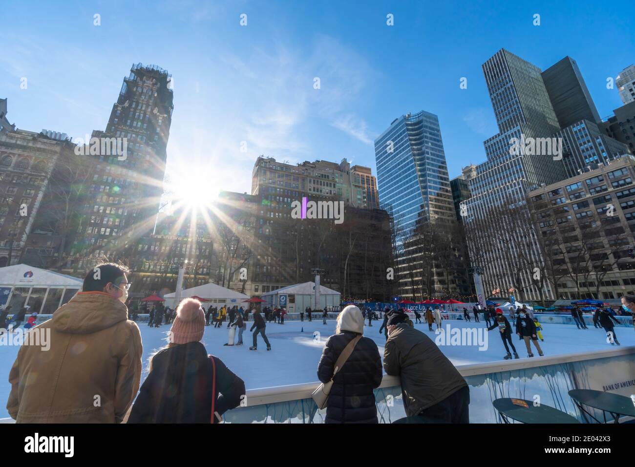 People enjoy Ice Skating at Bryant Park during the COVID-19 Pandemic. Stock Photo