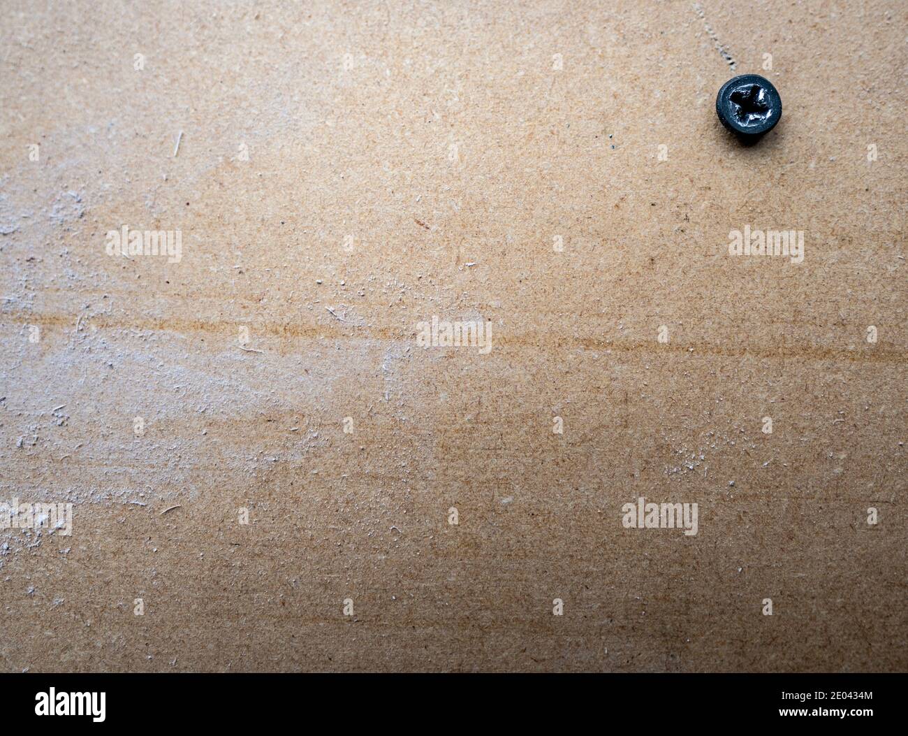 Damaged screw head caused by using the wrong bit and speed to install