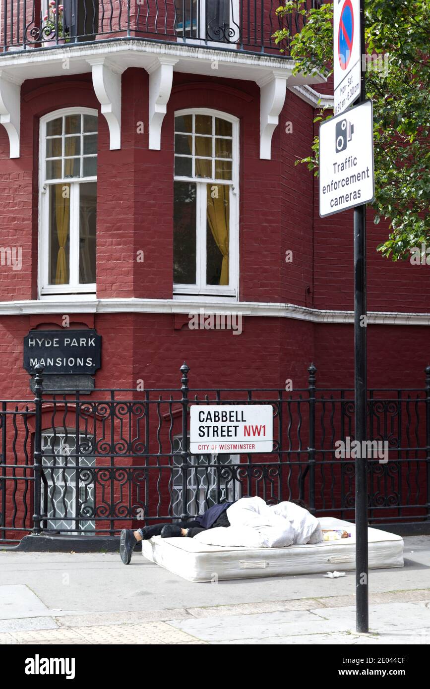 sleeping rough on a mattress, cabbel street, london NW1 Stock Photo