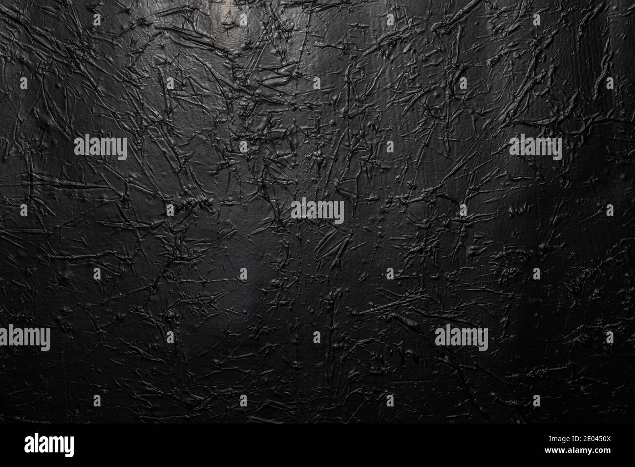 Black or dark gray crumpled texture background Stock Photo