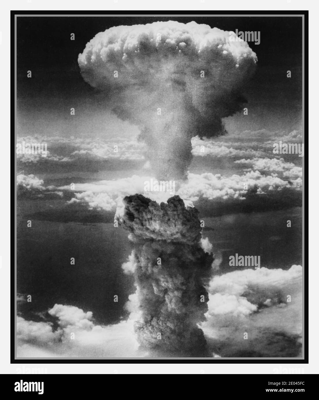 NAGASAKI ATOMIC BOMB WW2 American Atomic Bomb Mushroom Cloud Over Nagasaki, Japan under atomic bomb attack / U.S. Army A.A.F. photo. Photograph shows atomic bomb mushroom cloud over Nagasaki.United States. Army Air Forces, photographer Nagasaki, Japan], [9 August 1945] World War, 1939-1945--Air operations--Japan--Nagasaki-shi -  Mushroom clouds--Japan--Nagasaki-shi--1940-1950 -  Atomic bombs--Japan--Nagasaki-shi--1940-1950 Stock Photo