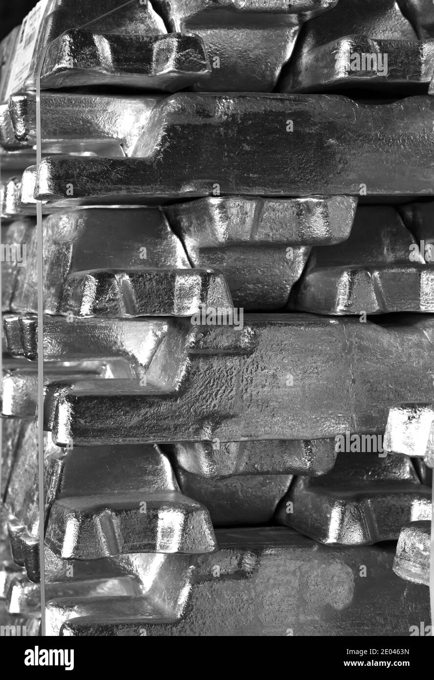 industry background picture of aluminum ingots stacked and stored, black and white photography Stock Photo