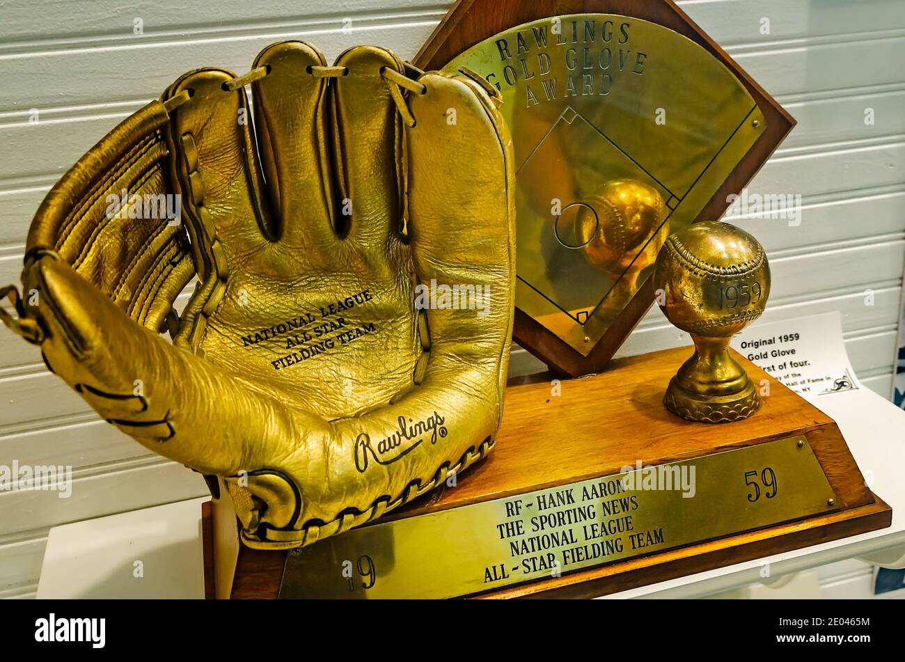 Hank Aaron’s Rawlings Gold Glove Award from 1959 is displayed at the Hank Aaron Childhood Home and Museum, Aug. 23, 2017, in Mobile, Alabama. Stock Photo