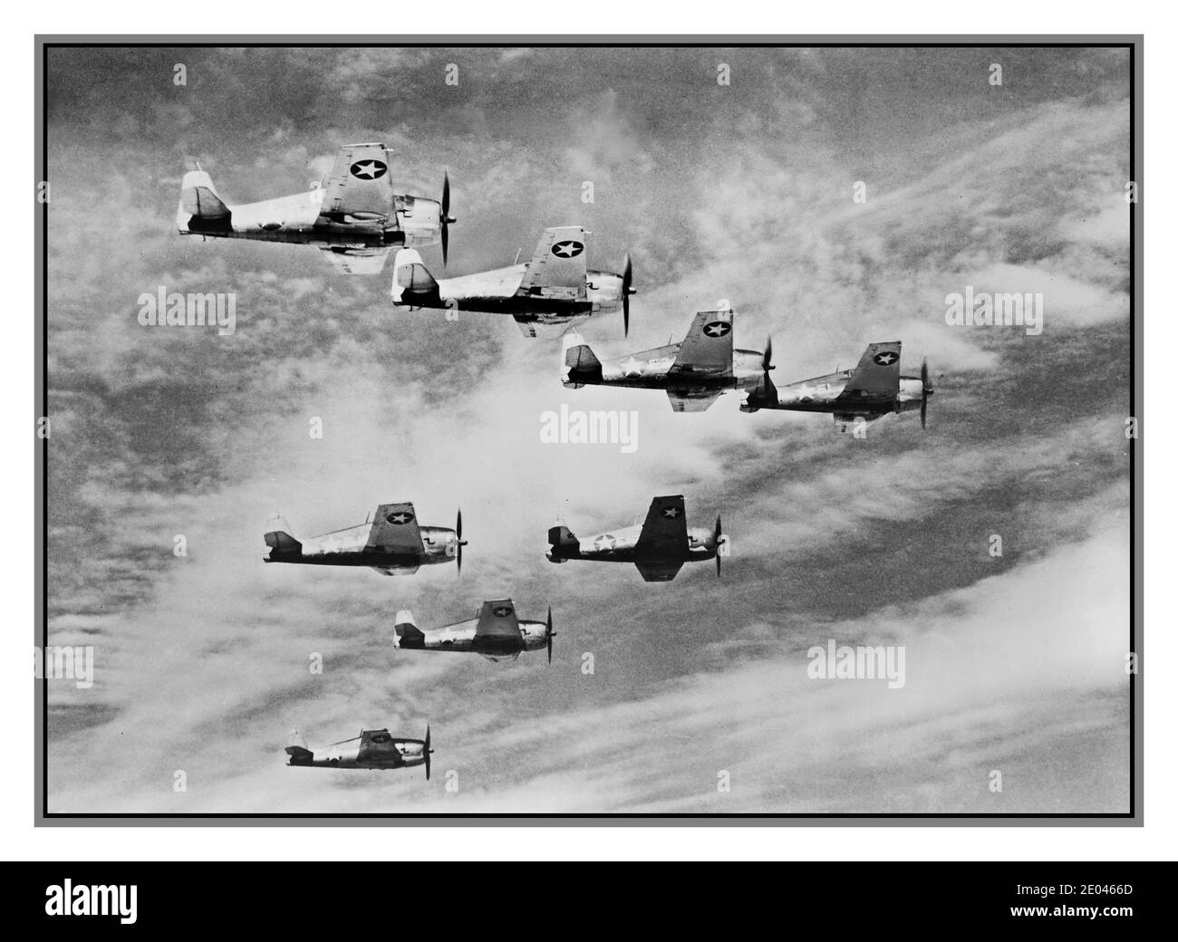 WW2 USA Propaganda aerial image titled  “Something that will go upstairs faster' Aerial view of eight Grumman Hellcat airplanes in flight. 1943.  Airplanes--United States--1940-1950 World War, 1939-1945--Equipment & supplies--American Aerial photographs World War II Stock Photo