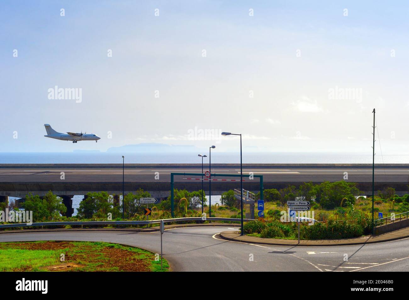 Airplane landing at airport runaway. Funchal, Madeira Stock Photo