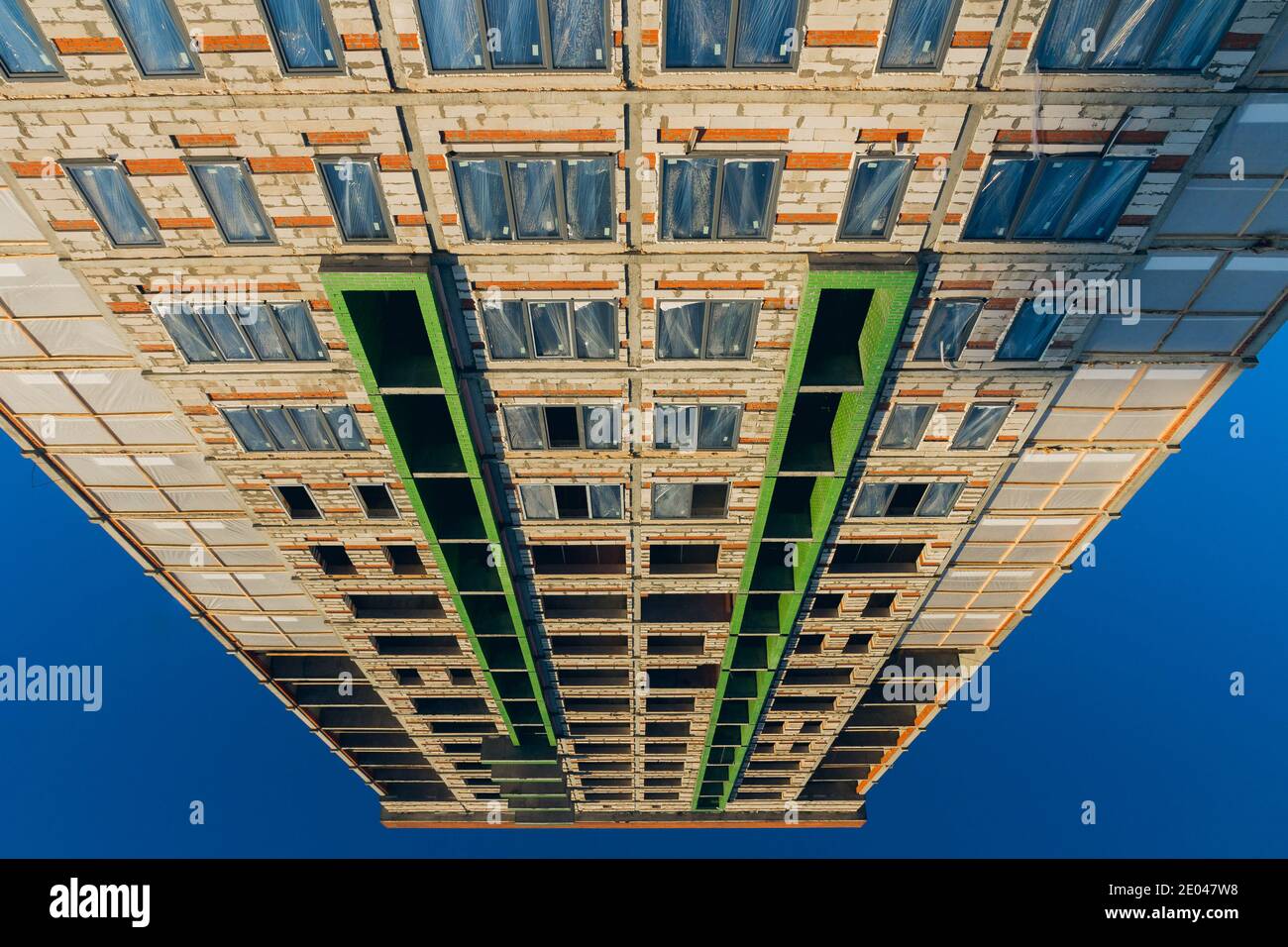 City view. Modern high-rise residential buildings against the blue sky ...