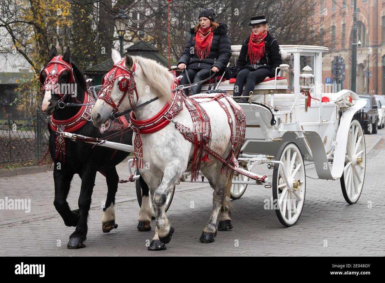 KRAKOW, POLAND - NOVEMBER 25: A traditional horse and cart in the town centre on November 25, 2019 in Krakow, Poland. Stock Photo
