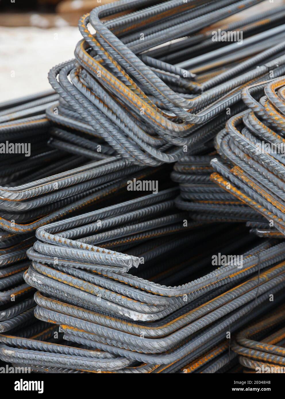 Steel rods for construction. Metal for concrete base. Close up of iron rods used for construction Stock Photo
