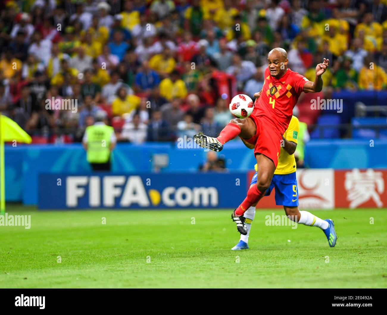 KAZAN, RUSSIA 6 July 2018: Vincent Kompany of Belgium is diving for ball during the 2018 FIFA World Cup Russia Quarter Final match between Brazil and Stock Photo