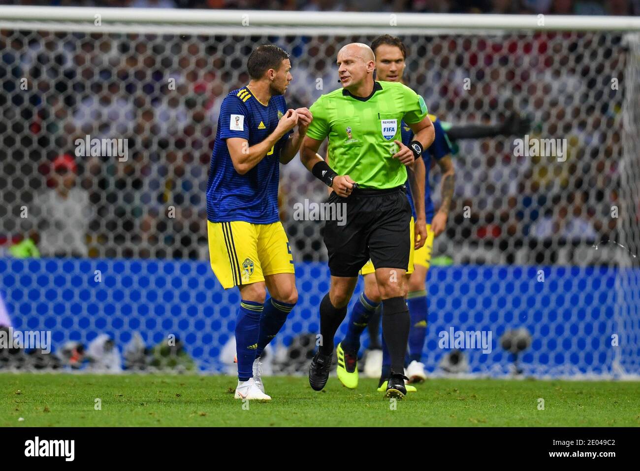 SOCHI, RUSSIA-23 JUNE 2018  Marcus Berg (L) of Sweden protests to Referee Szymon Marciniak during the Russia 2018 World Cup Group F football match bet Stock Photo