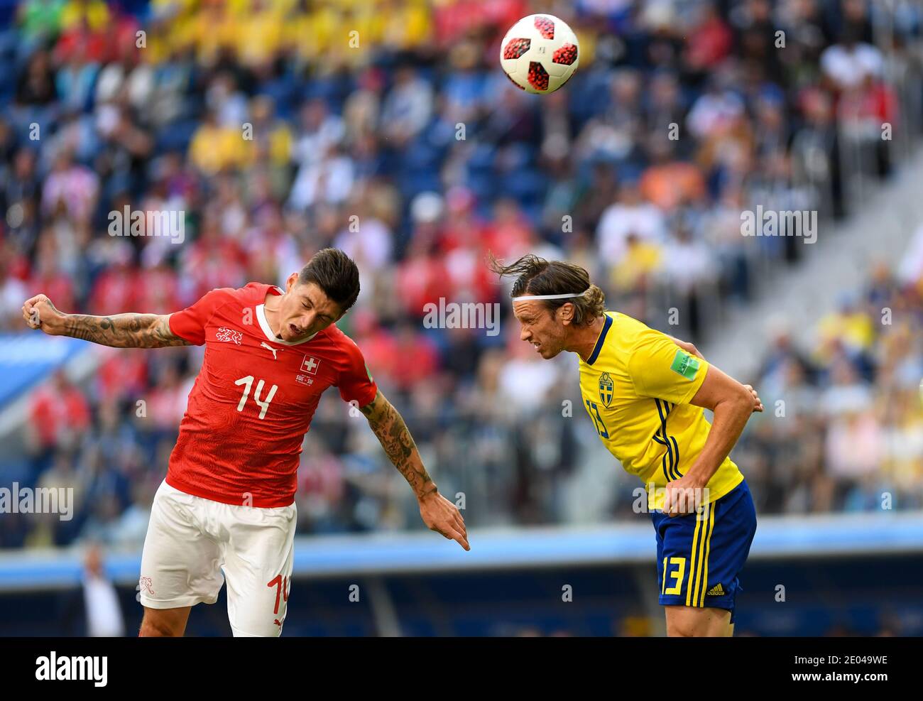 SAINT PETERSBURG, RUSSIA- 3 July 2018: Steven Zuber (L) of Switzerland vs Gustav Svensson of Sweden during the 2018 FIFA World Cup Russia Round of 16 Stock Photo