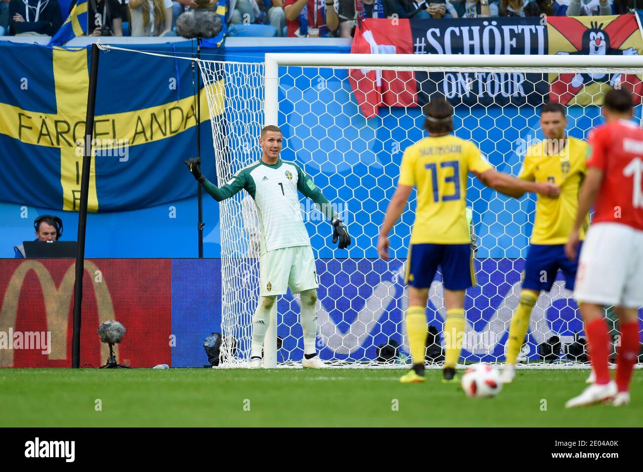 SAINT PETERSBURG, RUSSIA- 3 July 2018: Goal keeper Robin Olsen (L) of Sweden controlling teammates during the 2018 FIFA World Cup Russia Round of 16 m Stock Photo
