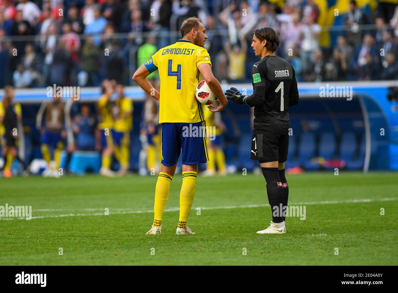 SAINT PETERSBURG, RUSSIA- 3 July 2018: Andreas Granqvist (L) of Sweden & Goal keeper Yann Sommer of Switzerland during the 2018 FIFA World Cup Russia Stock Photo