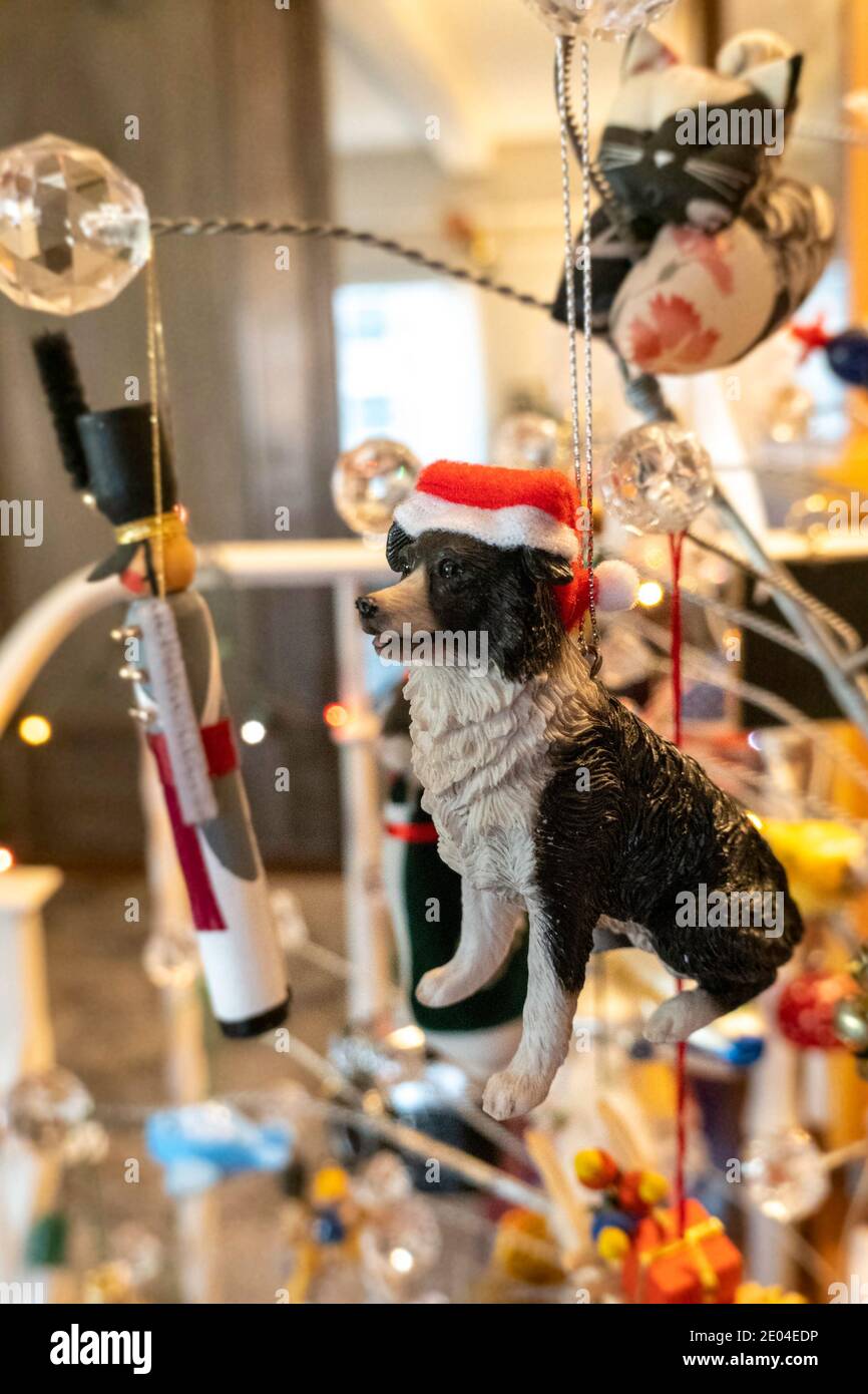 Christmas Ornaments on Modern Holiday Tree Stock Photo