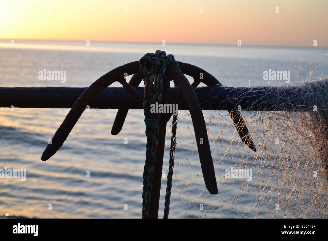 Anchor And Sunrise On The North East Coast - Filey - UK Stock Photo