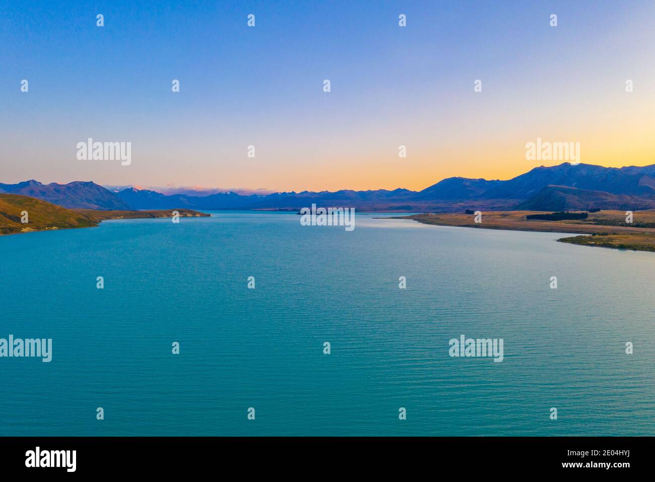 Sunset view of lake Tekapo in New Zealand Stock Photo - Alamy