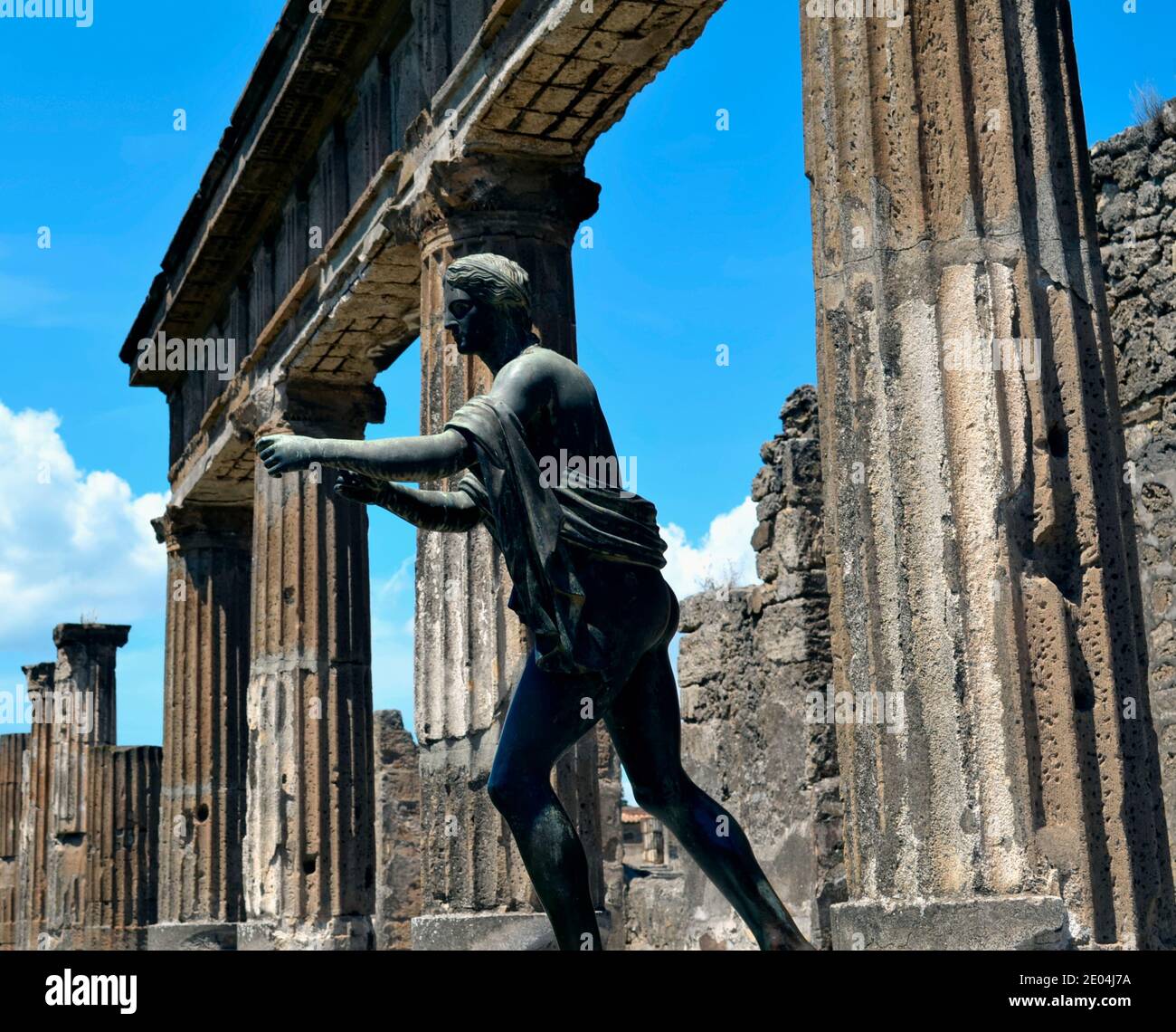 Statue and Ruins of Temple of Apollo in Pompeii Italy Stock Photo