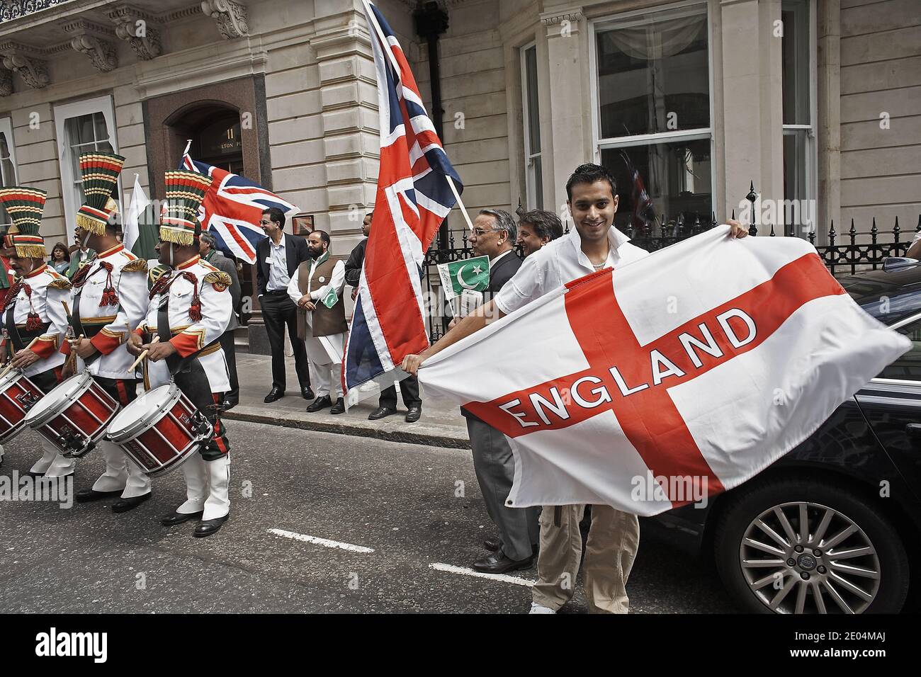 Young Pakistani man with St George's flag during the Pakistan independence festival which took place in London on Saturday 28th July 2007. Stock Photo