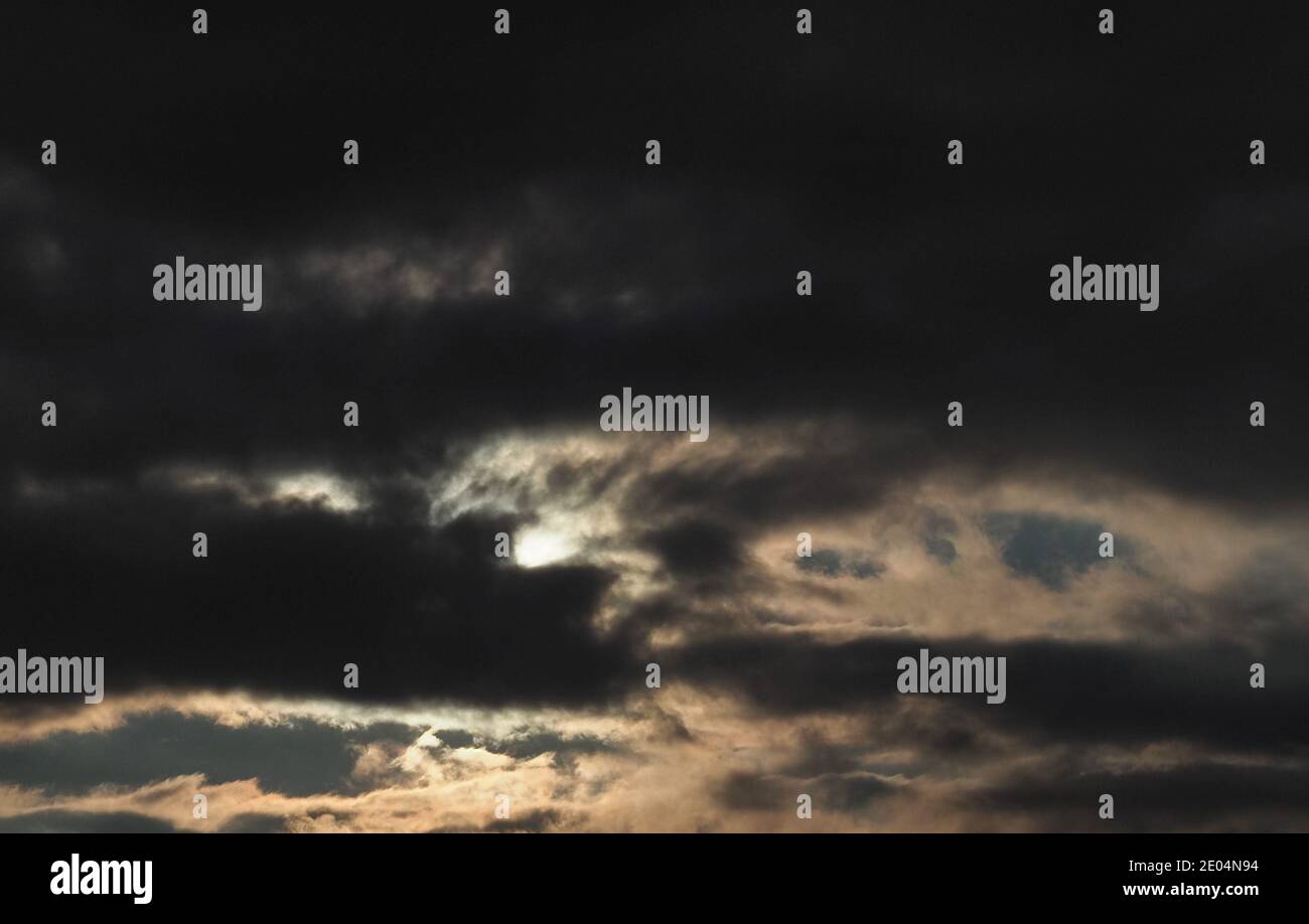 dramatic dark stormy sky with clouds at sunset Stock Photo - Alamy