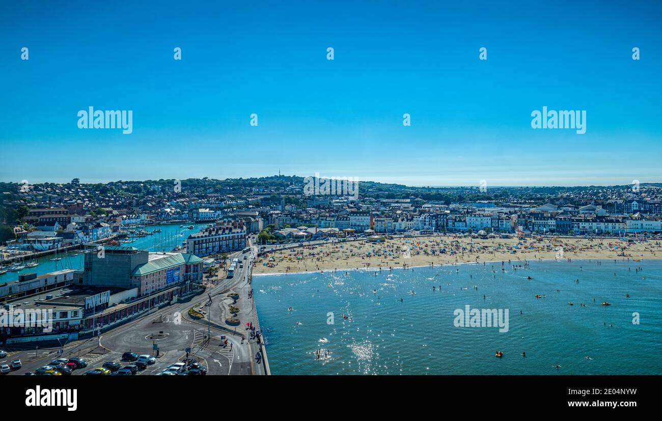 Panoramic view overlooking Weymouth harbour, beach and the Weymouth Pavilion entertainment and theatre arena. Dorset, England, UK Stock Photo