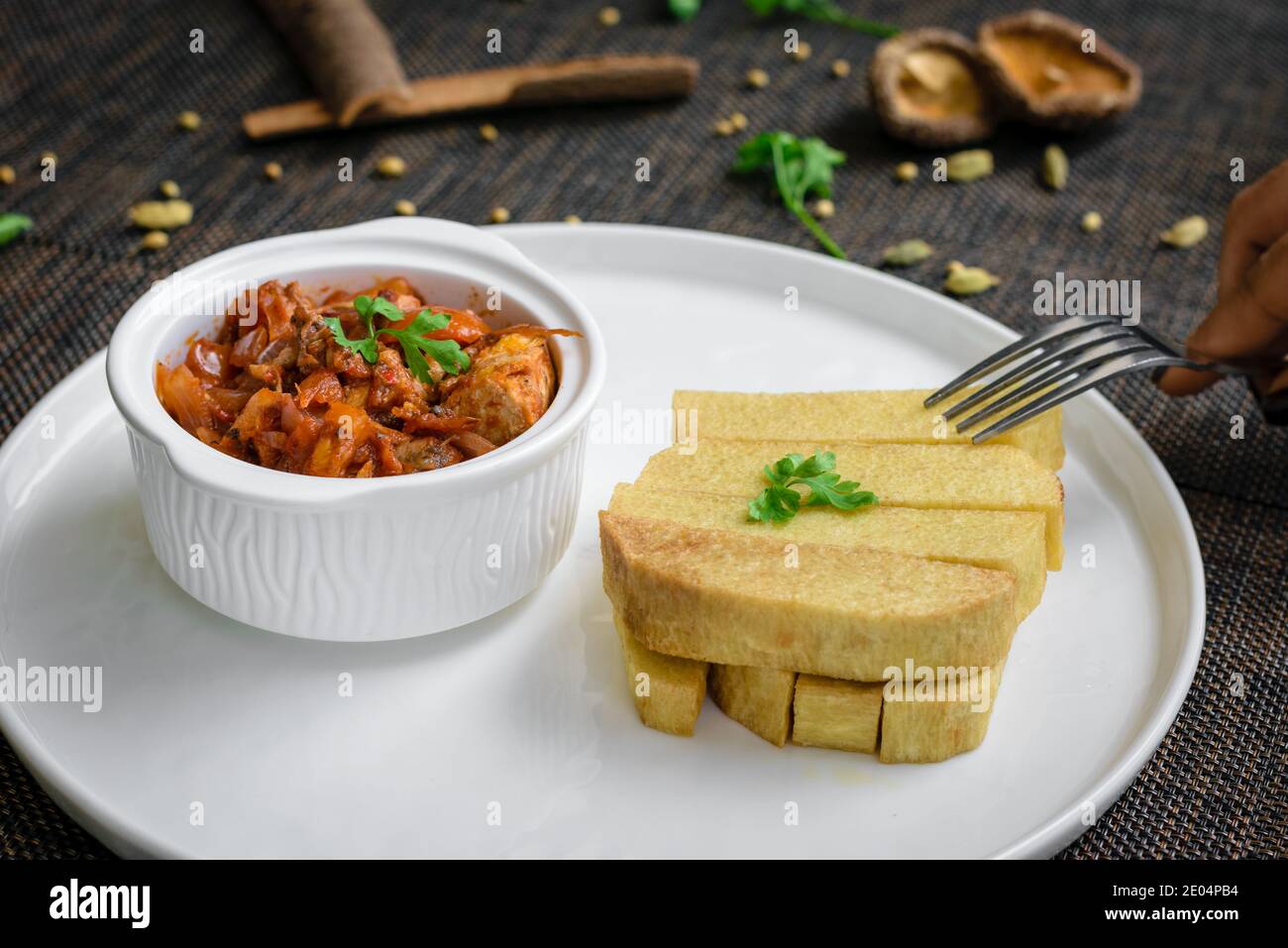 Cooked yam with fried egg sauce hires stock photography and images Alamy
