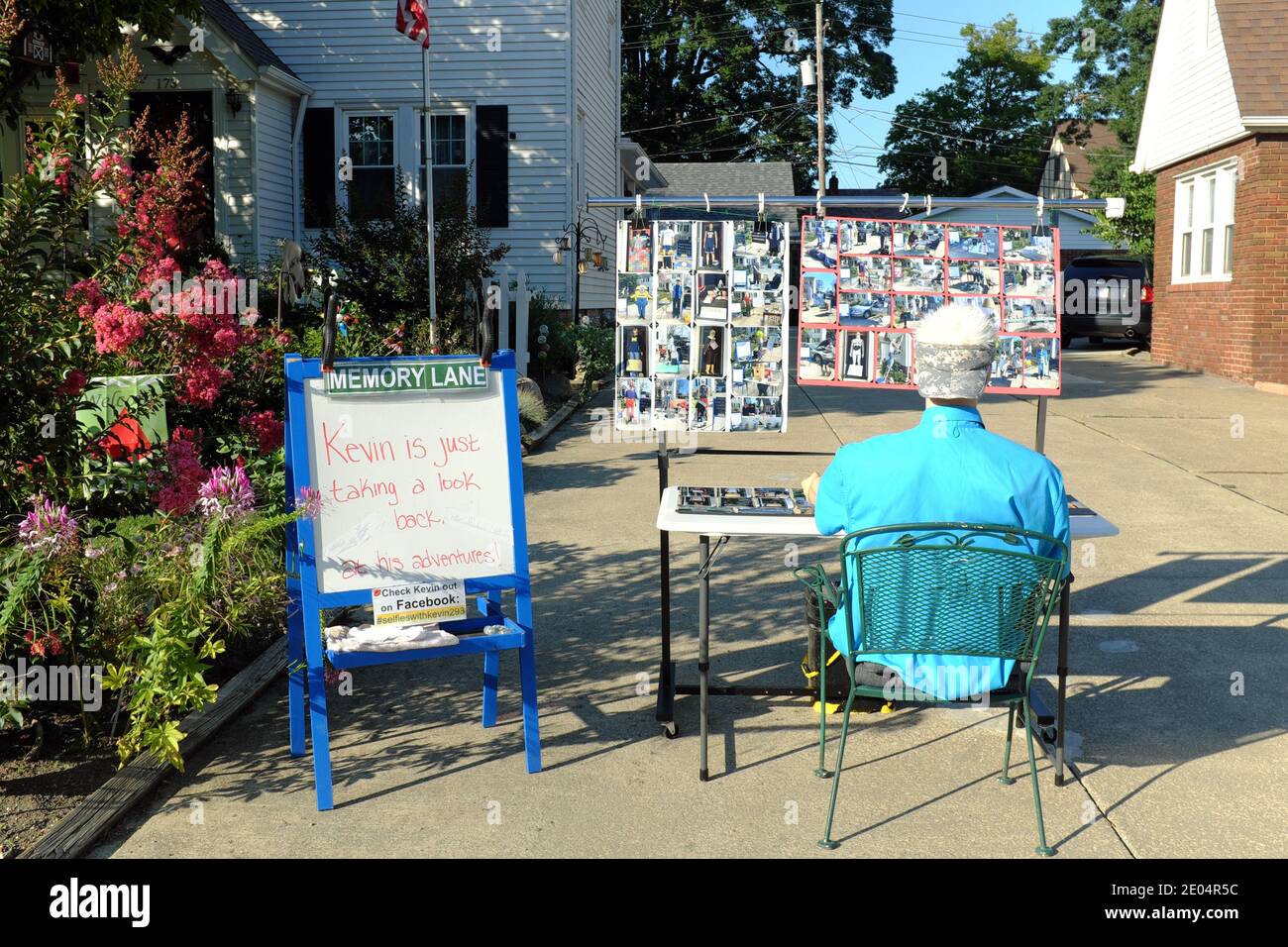 Kevin the mannequin is a daily changing diorama in a suburban driveway created as a way to bring smiles to people during the pandemic. Stock Photo