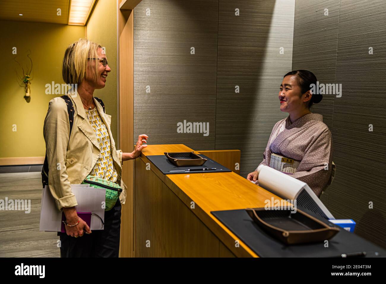 Receptionist at the Hotel Okura in Tokyo, Minato, Japan Stock Photo