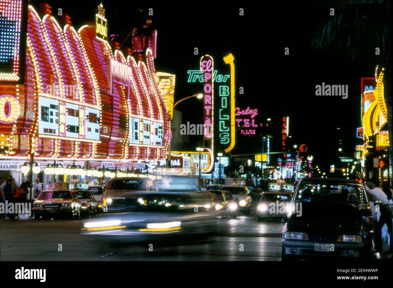 Colorful neon signs at night on Fremont Street in Downtown Las Vegas, Nevada circa 1970s Stock Photo