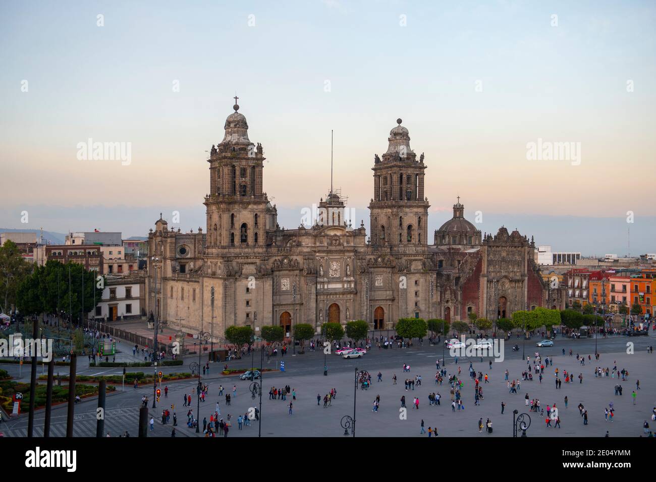 Zocalo Constitution Square and Metropolitan Cathedral at sunset at Historic center of Mexico City CDMX, Mexico. Historic center of Mexico City is a UN Stock Photo