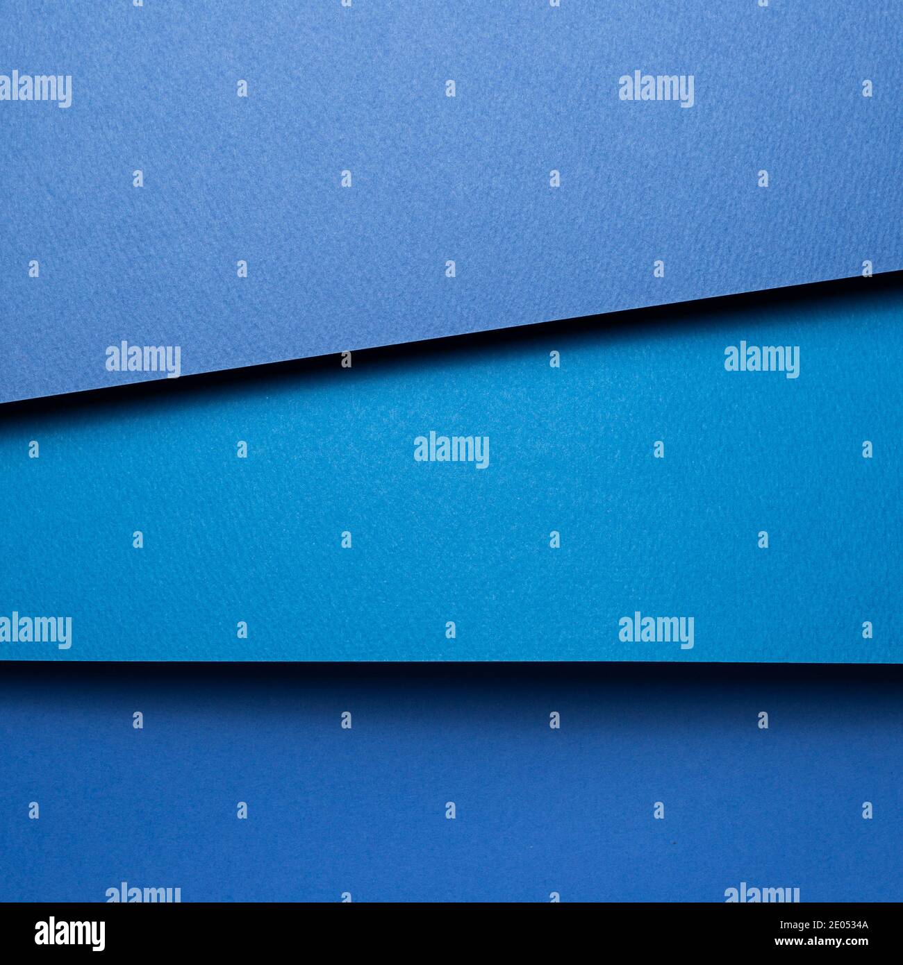Abstract blue layered color paper background Stock Photo Alamy