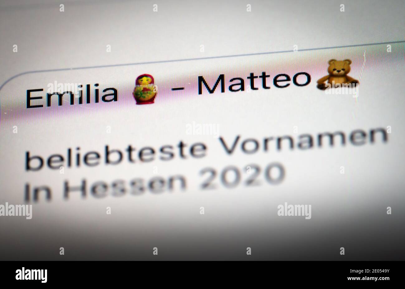 ILLUSTRATION - 29 December 2020, Hessen, Frankfurt/Main: The names Emilia and Matteo can be seen on the display of a mobile phone. They are the most popular first names for girls and boys in Hesse in 2020, as determined by the North German first name expert Knud Bielefeld, who publishes statistics on this every year. Photo: Frank Rumpenhorst/dpa Stock Photo
