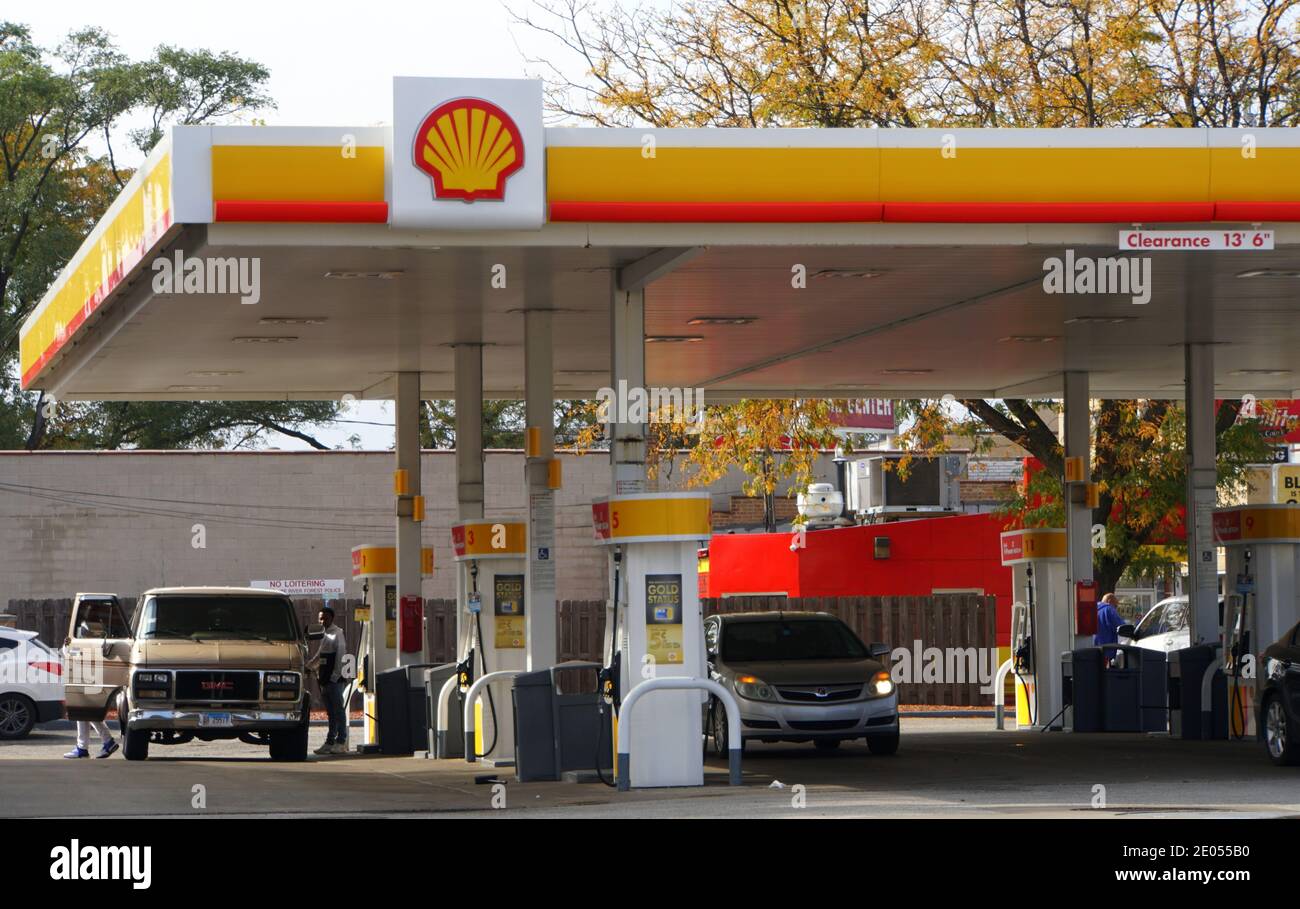 Chicago, Illinois, U.S.A October 14, 2018 Drivers putting gas in