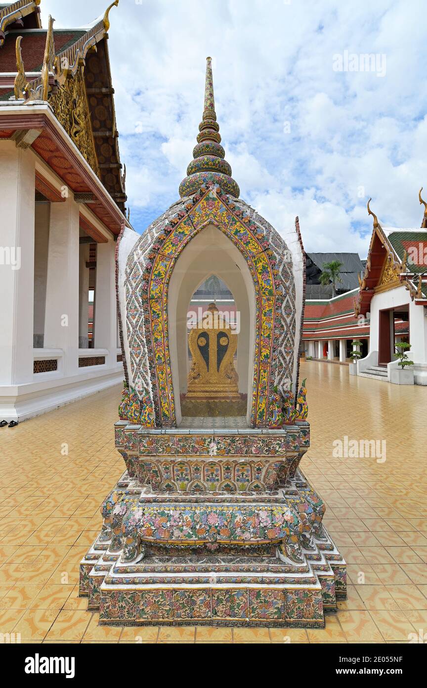One of the eight cardinal boundary or sima (sema) stones at the ordination hall (ubosot) at Wat Saket, a Buddhist monastery in Bangkok, Thailand Stock Photo