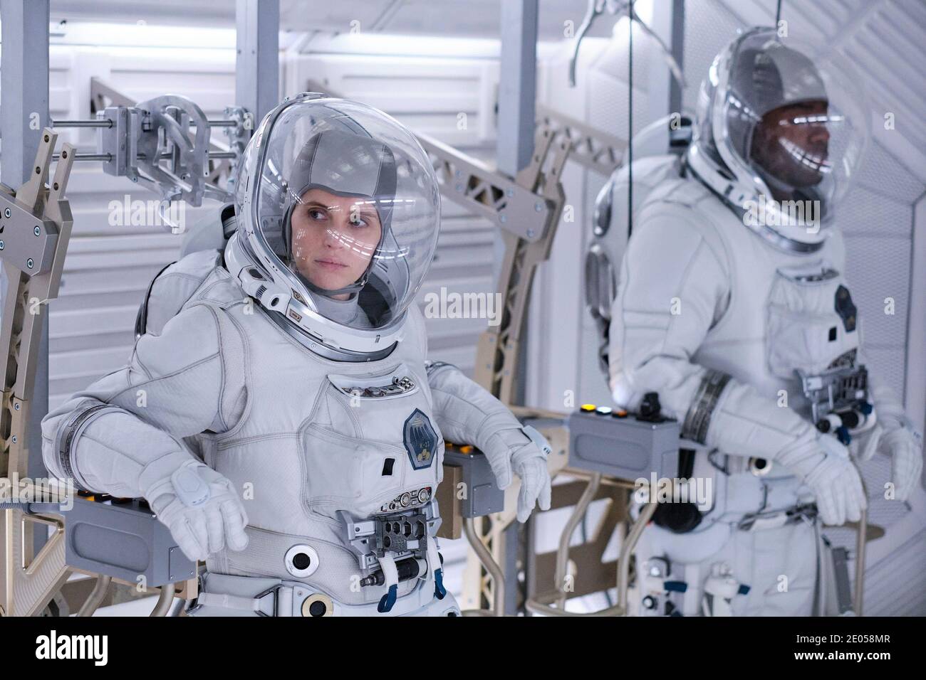 RELEASE DATE: TITLE: December 23, 2020 The Midnight Sky STUDIO: Netflix DIRECTOR: George Clooney PLOT: This post-apocalyptic tale follows Augustine, a lonely scientist in the Arctic, as he races to stop Sully and her fellow astronauts from returning home to a mysterious global catastrophe. STARRING: FELICITY JONES as Sully, DAVID OYELOWO as Adewole. (Credit Image: © Netflix/Entertainment Pictures) Stock Photo