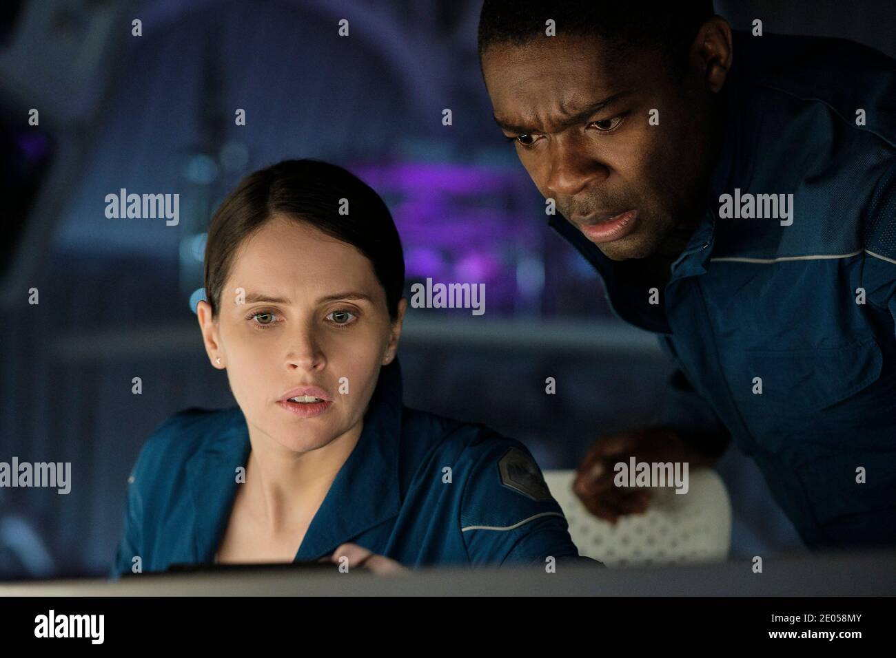 RELEASE DATE: TITLE: December 23, 2020 The Midnight Sky STUDIO: Netflix DIRECTOR: George Clooney PLOT: This post-apocalyptic tale follows Augustine, a lonely scientist in the Arctic, as he races to stop Sully and her fellow astronauts from returning home to a mysterious global catastrophe. STARRING: FELICITY JONES as Sully, DAVID OYELOWO as Tom Adewole. (Credit Image: © Netflix/Entertainment Pictures) Stock Photo