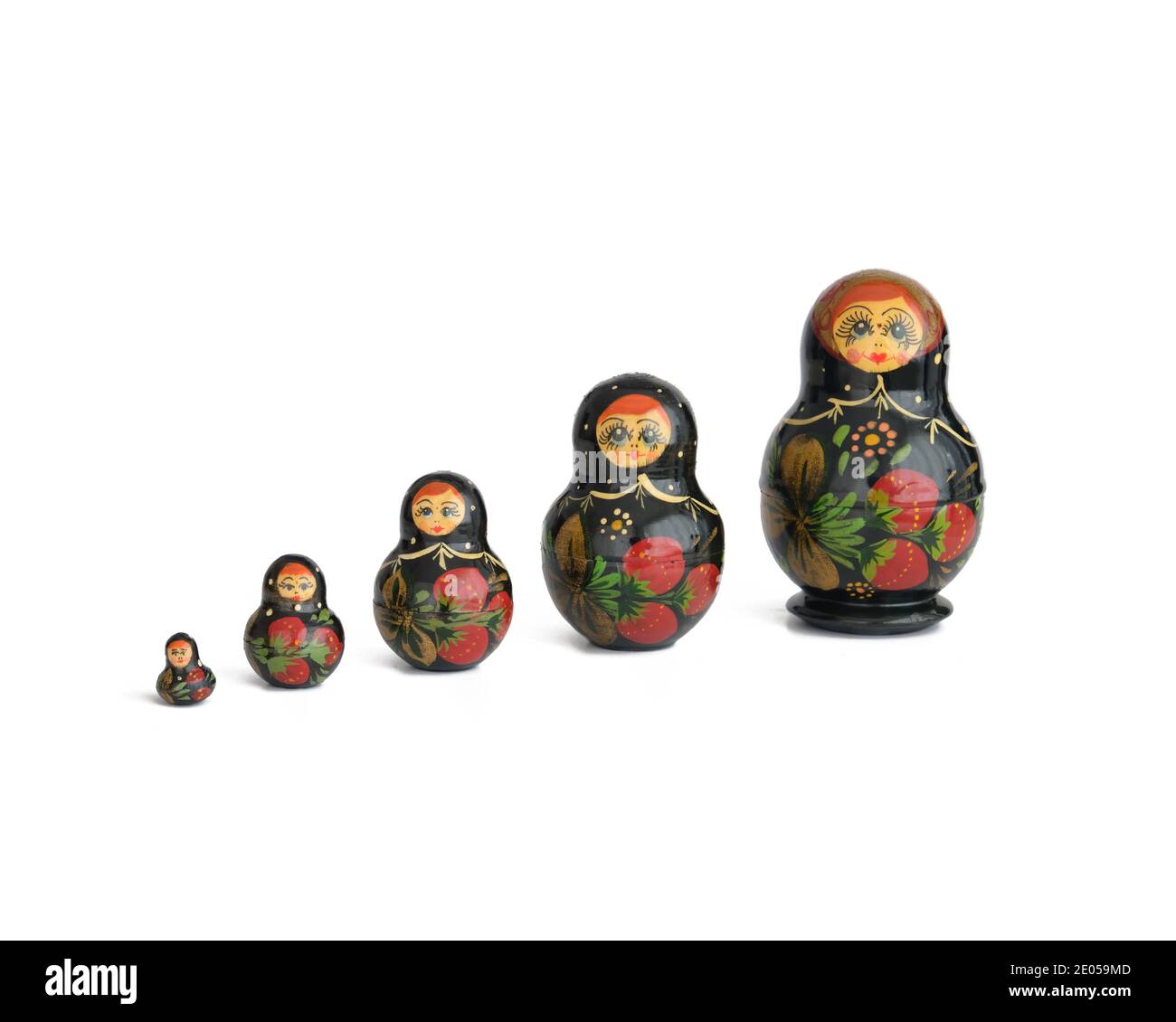 Matryoshka Dolls Isolated On White Surface Stock Photo