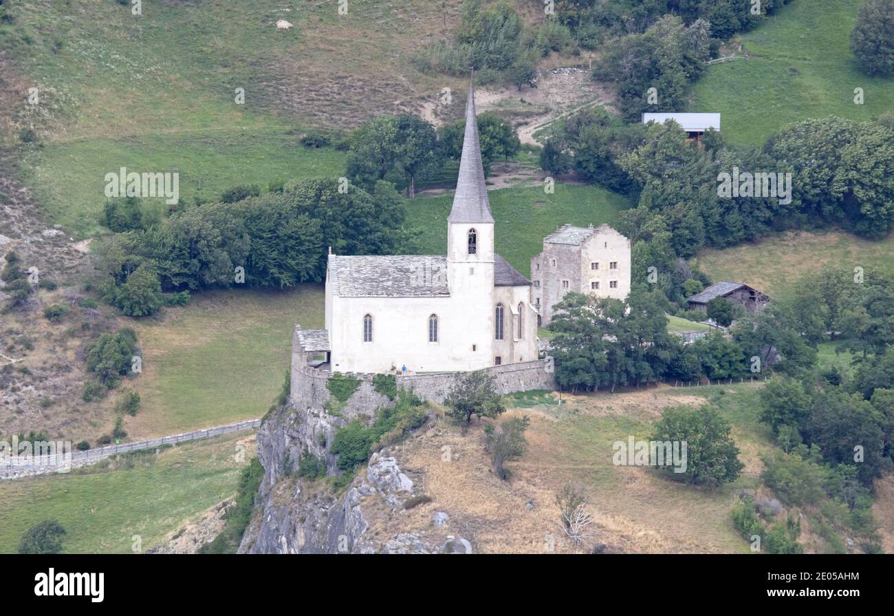 Raron, Switzerland on july 16, 2020: Raron Burgkirche, old church on high rock in Switzerland Stock Photo