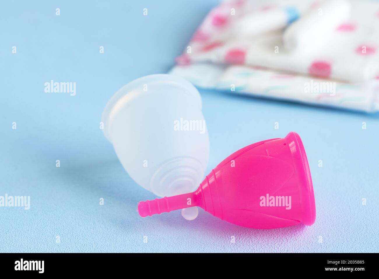 Menstrual cup and hygienic pad on table close up Stock Photo Alamy