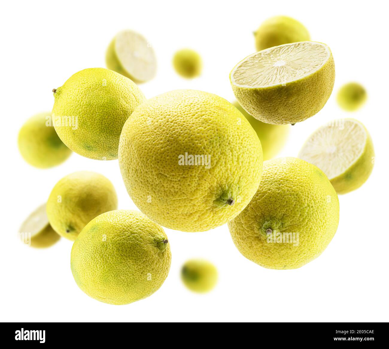 Yellow limes levitate on a white background Stock Photo Alamy