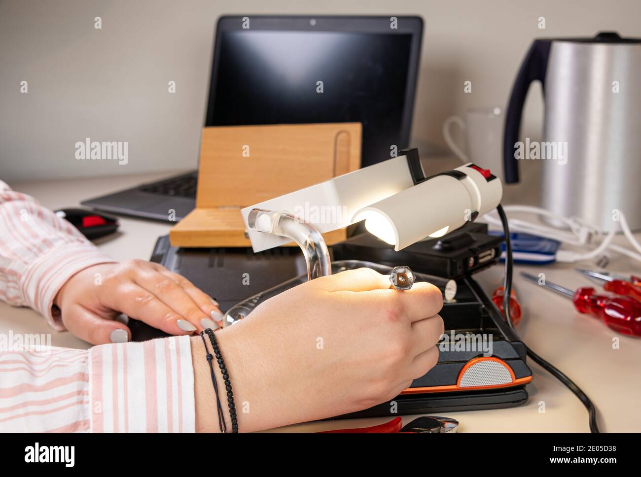 Fixing PC issues at the service desk Stock Photo Alamy