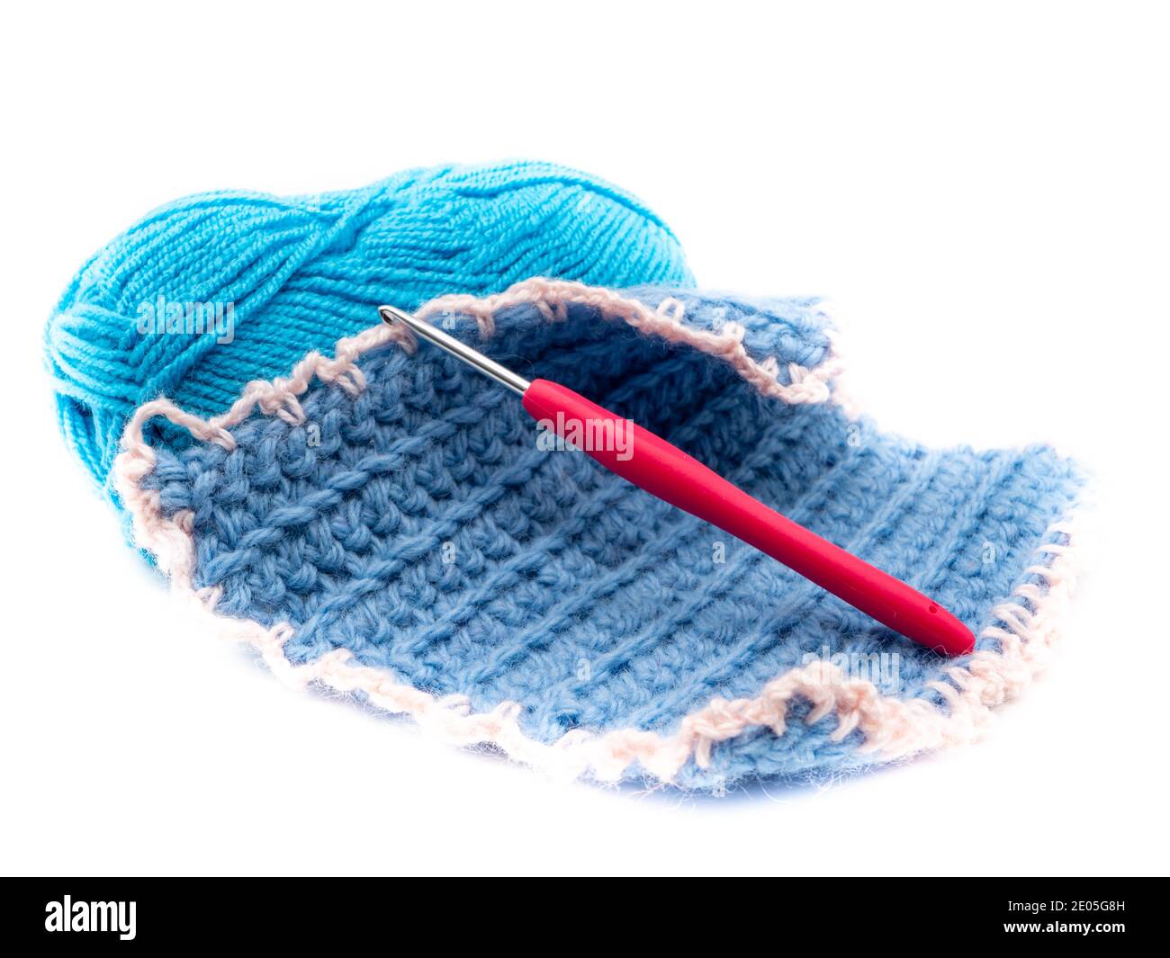 Pot holder with crochet hook and wool isolated on white background ...