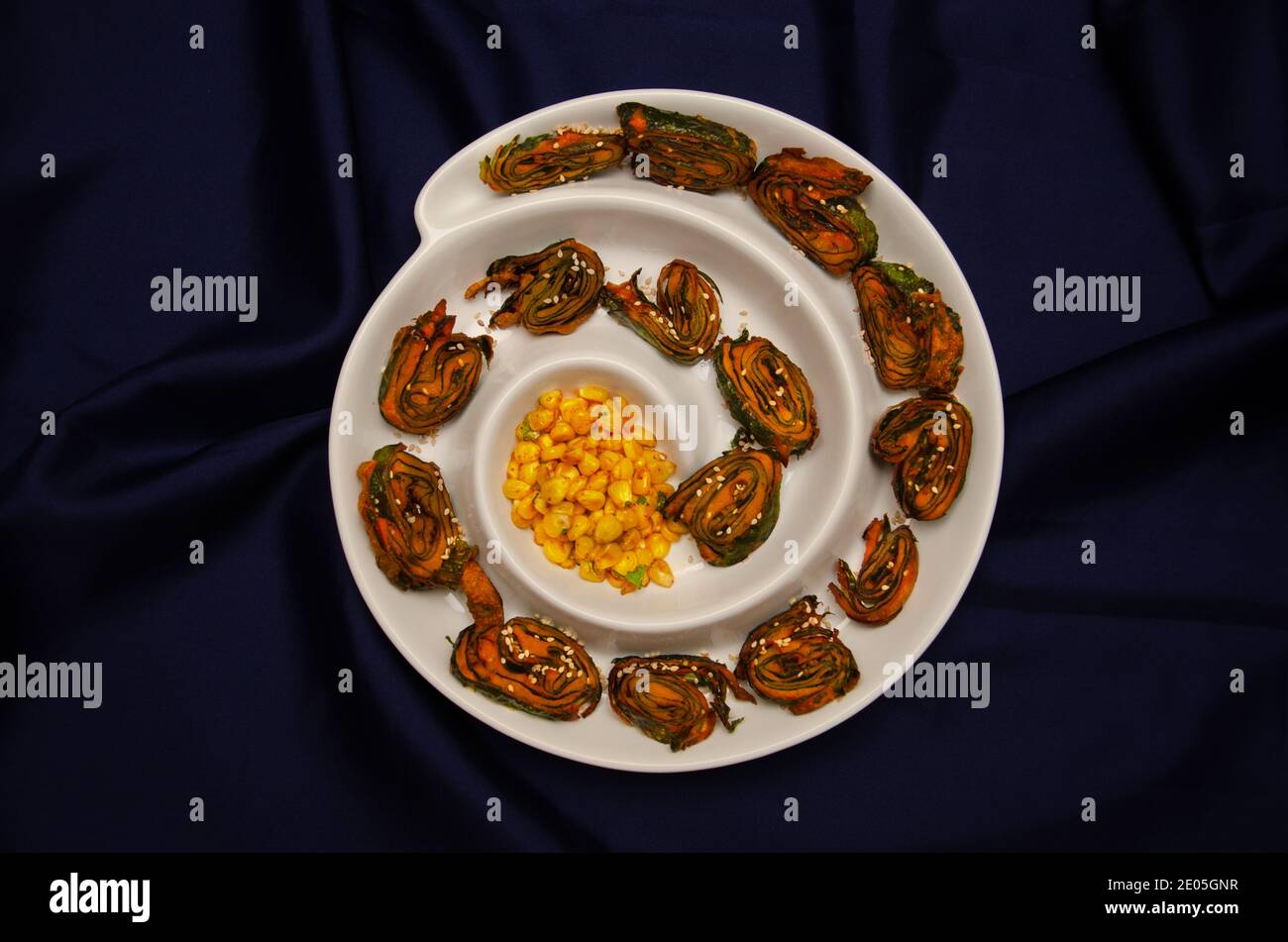 Alu Vadi or  Aluchi Vadi or Patra, Paatra is a popular maharashtrian and Gujarati snack made using colocasia leaves, besan , gram flour and spices Stock Photo